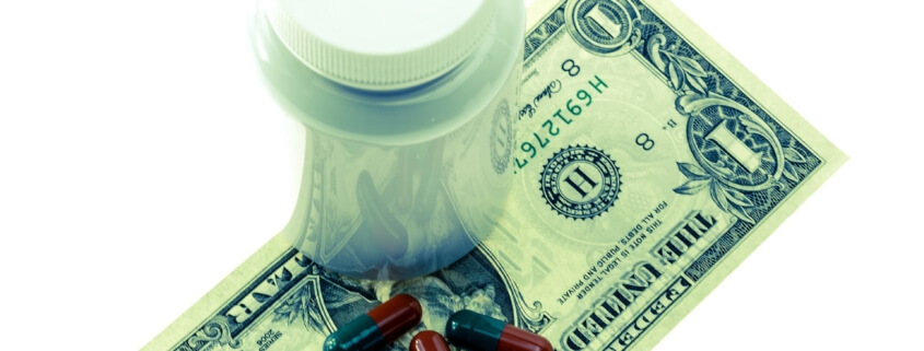 pills on dollar bill