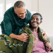 Son visiting mother in retirement home